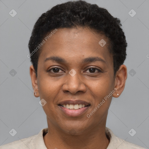 Joyful black young-adult female with short  black hair and brown eyes