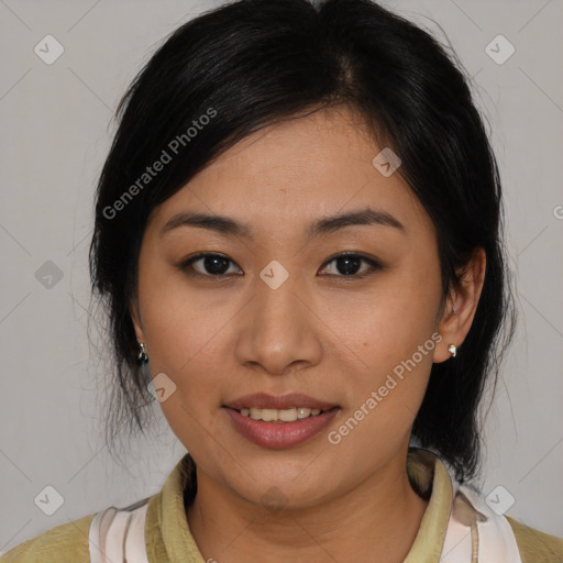 Joyful asian young-adult female with medium  black hair and brown eyes