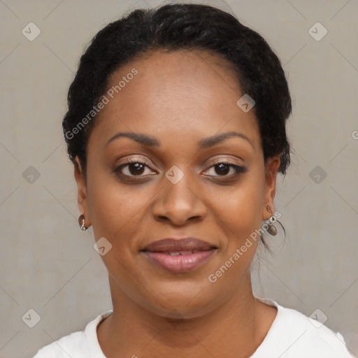 Joyful black young-adult female with short  black hair and brown eyes