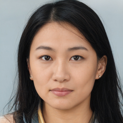 Neutral asian young-adult female with long  brown hair and brown eyes