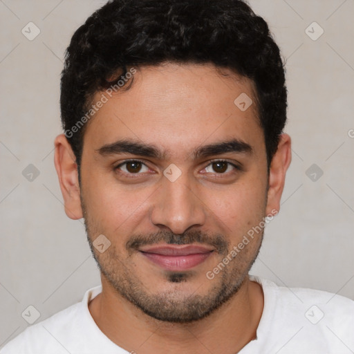 Joyful white young-adult male with short  black hair and brown eyes
