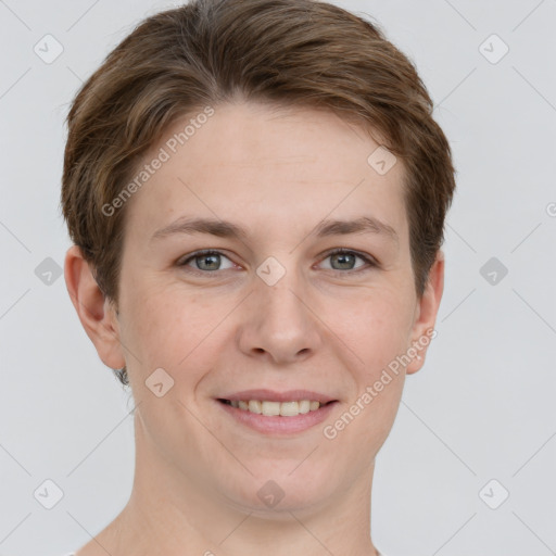 Joyful white young-adult female with short  brown hair and grey eyes