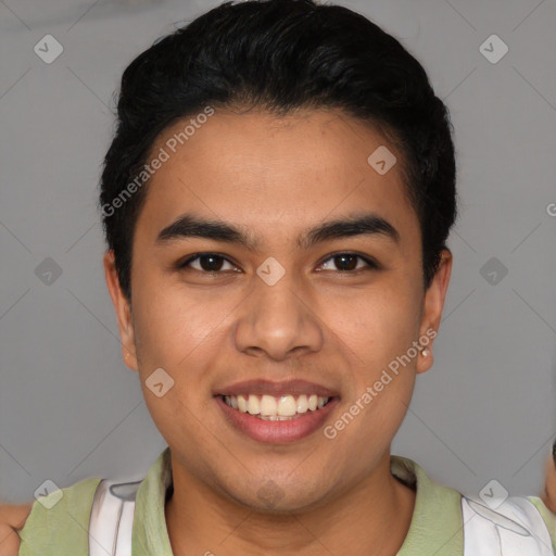 Joyful latino young-adult male with short  brown hair and brown eyes