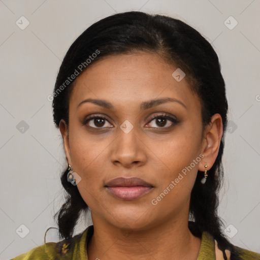 Joyful black young-adult female with medium  brown hair and brown eyes