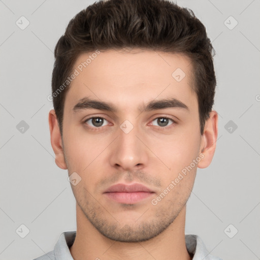 Neutral white young-adult male with short  brown hair and brown eyes