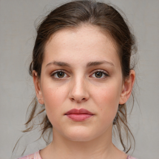 Neutral white young-adult female with medium  brown hair and grey eyes