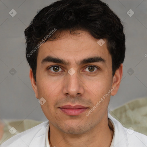 Joyful white young-adult male with short  black hair and brown eyes