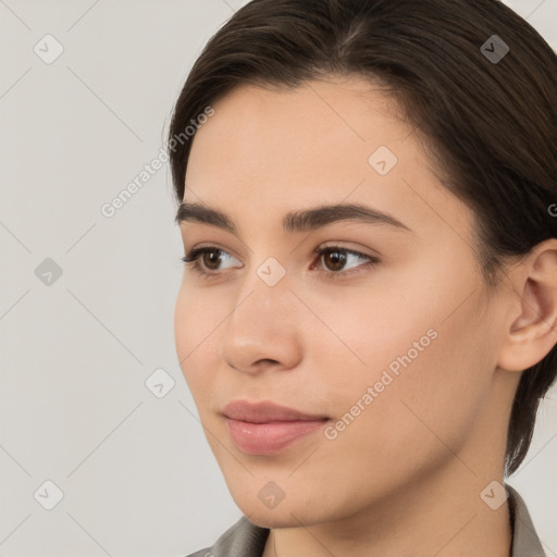 Neutral white young-adult female with medium  brown hair and brown eyes