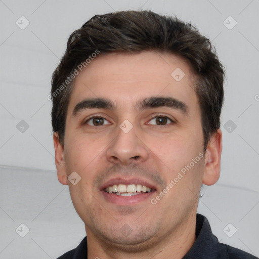 Joyful white young-adult male with short  black hair and brown eyes