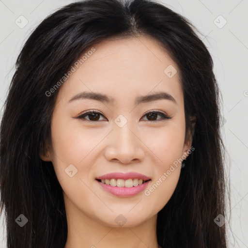 Joyful asian young-adult female with long  brown hair and brown eyes