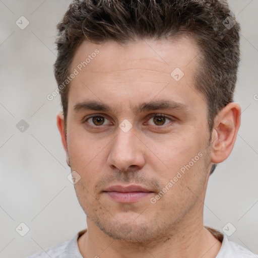 Neutral white young-adult male with short  brown hair and brown eyes