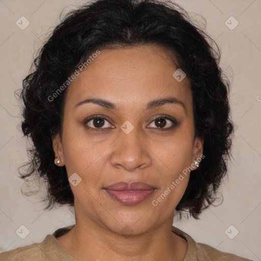 Joyful latino adult female with medium  brown hair and brown eyes