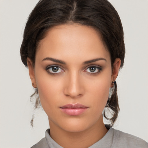 Neutral white young-adult female with medium  brown hair and brown eyes