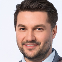 Joyful white young-adult male with short  brown hair and brown eyes