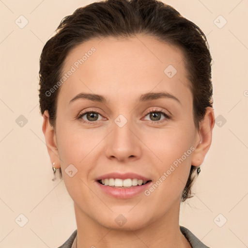 Joyful white young-adult female with short  brown hair and brown eyes