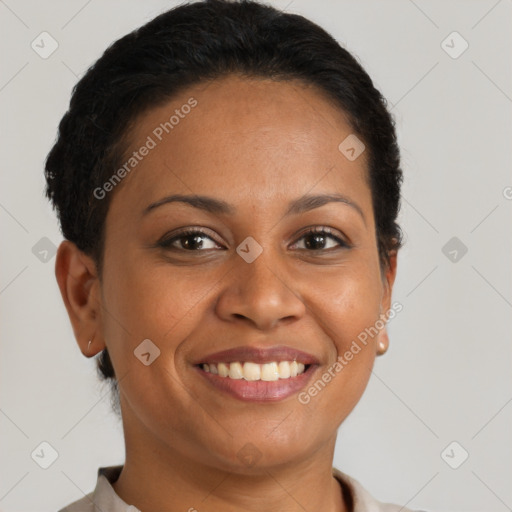 Joyful latino young-adult female with short  brown hair and brown eyes