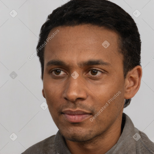 Neutral latino young-adult male with short  black hair and brown eyes