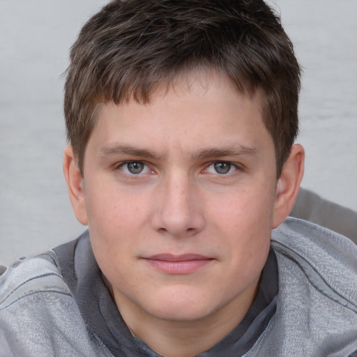 Neutral white young-adult male with short  brown hair and blue eyes