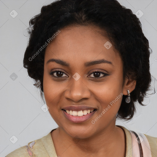 Joyful black young-adult female with long  black hair and brown eyes