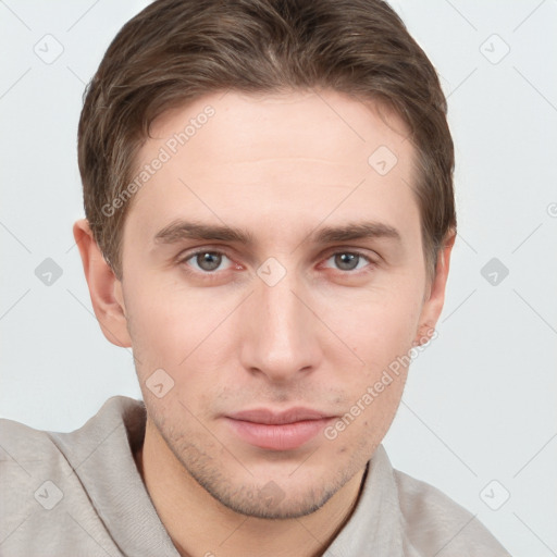 Neutral white young-adult male with short  brown hair and grey eyes