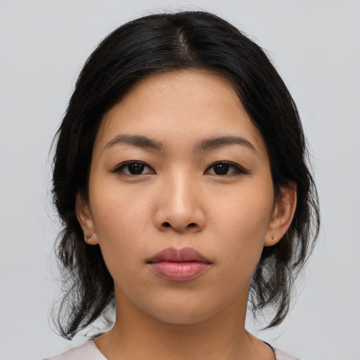 Neutral asian young-adult female with medium  black hair and brown eyes