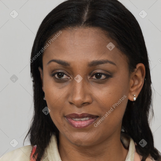 Joyful black adult female with medium  brown hair and brown eyes