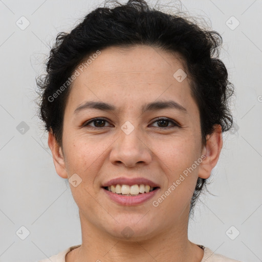 Joyful latino young-adult female with short  brown hair and brown eyes