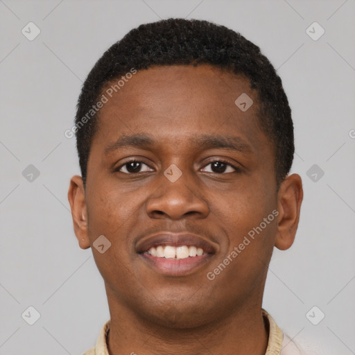 Joyful black young-adult male with short  brown hair and brown eyes