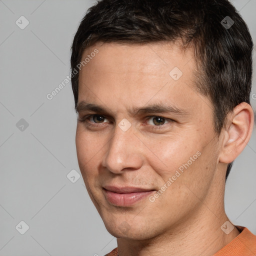 Joyful white adult male with short  brown hair and brown eyes