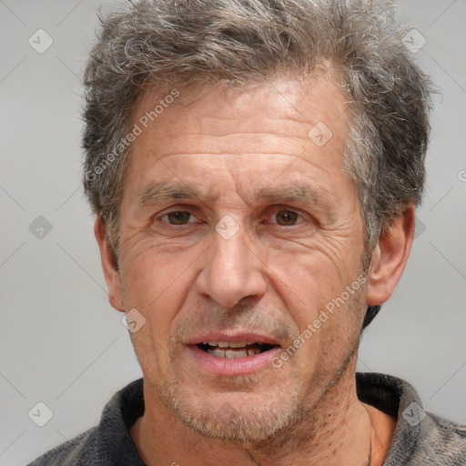 Joyful white middle-aged male with short  brown hair and brown eyes