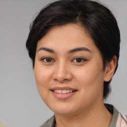 Joyful white young-adult female with medium  brown hair and brown eyes