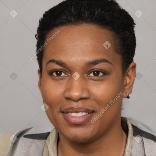 Joyful black young-adult female with short  black hair and brown eyes