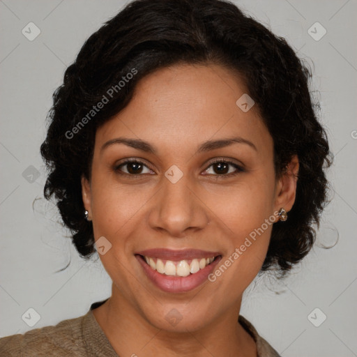 Joyful black young-adult female with medium  brown hair and brown eyes