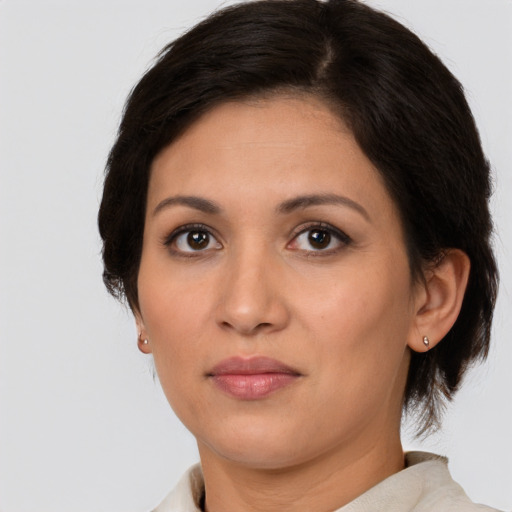 Neutral white adult female with medium  brown hair and brown eyes
