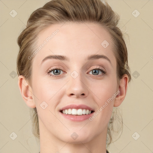 Joyful white young-adult female with medium  brown hair and green eyes