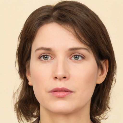 Neutral white young-adult female with medium  brown hair and brown eyes