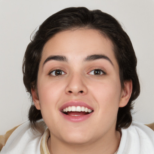 Joyful white young-adult female with medium  brown hair and brown eyes