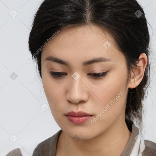 Neutral asian young-adult female with medium  brown hair and brown eyes