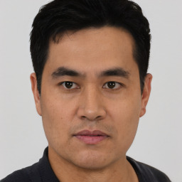 Neutral asian young-adult male with short  black hair and brown eyes