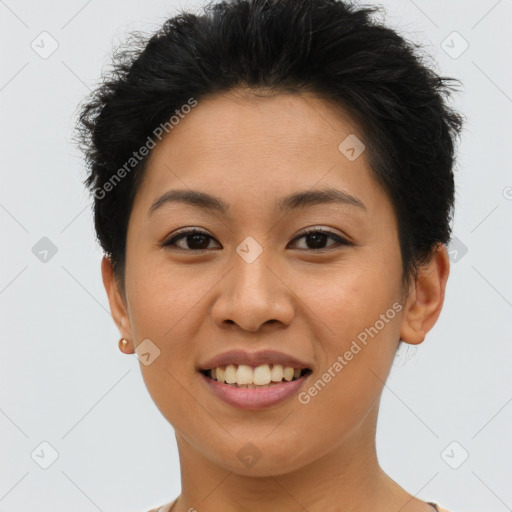 Joyful latino young-adult female with short  brown hair and brown eyes