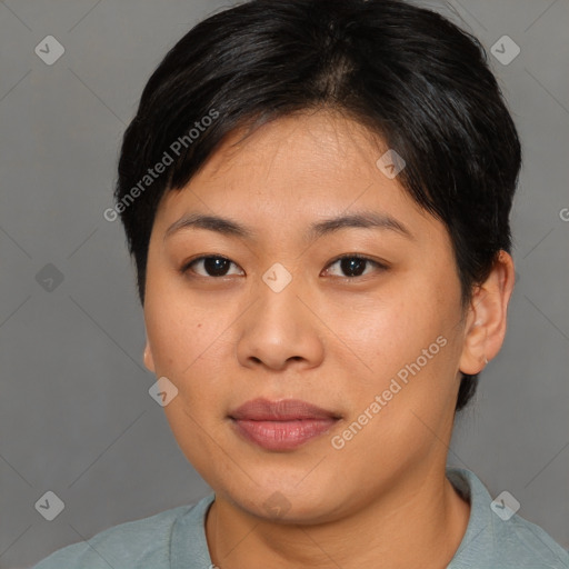 Joyful asian young-adult female with short  brown hair and brown eyes