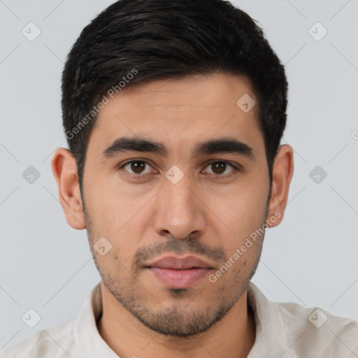 Joyful latino young-adult male with short  brown hair and brown eyes