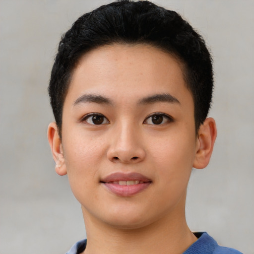 Joyful asian young-adult female with short  black hair and brown eyes