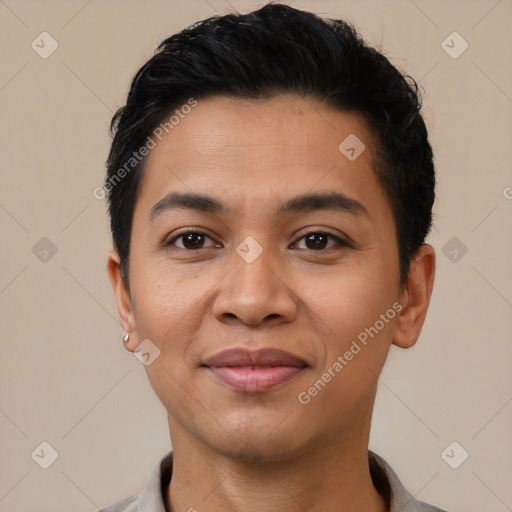 Joyful latino young-adult male with short  black hair and brown eyes