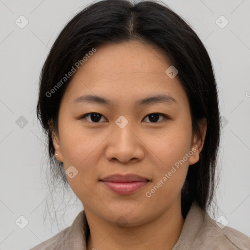 Joyful asian young-adult female with medium  brown hair and brown eyes