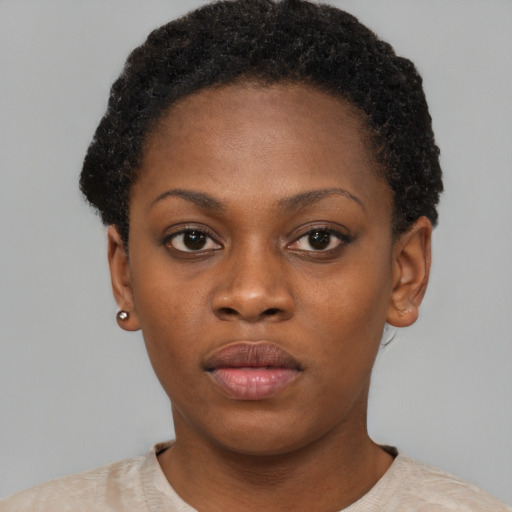 Neutral black young-adult female with short  brown hair and brown eyes