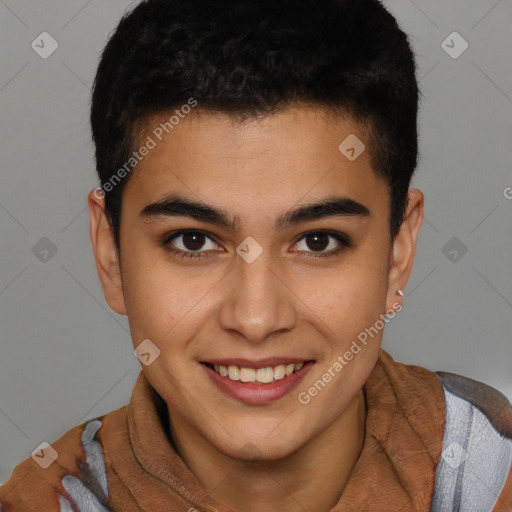 Joyful latino young-adult male with short  brown hair and brown eyes