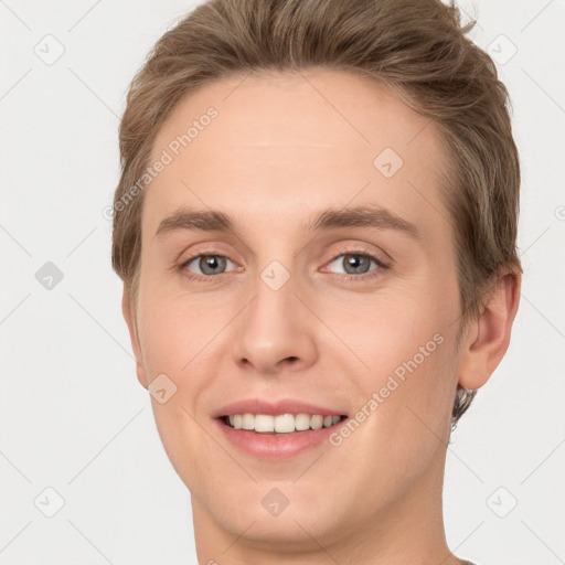 Joyful white young-adult female with short  brown hair and grey eyes