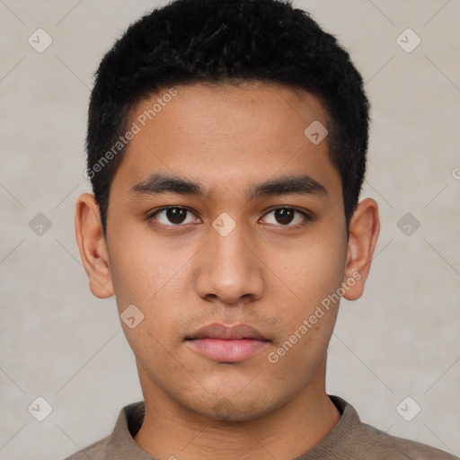 Neutral latino young-adult male with short  black hair and brown eyes