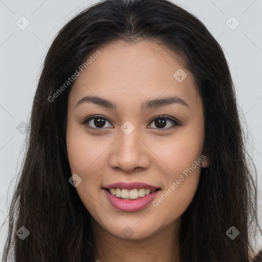 Joyful asian young-adult female with long  brown hair and brown eyes